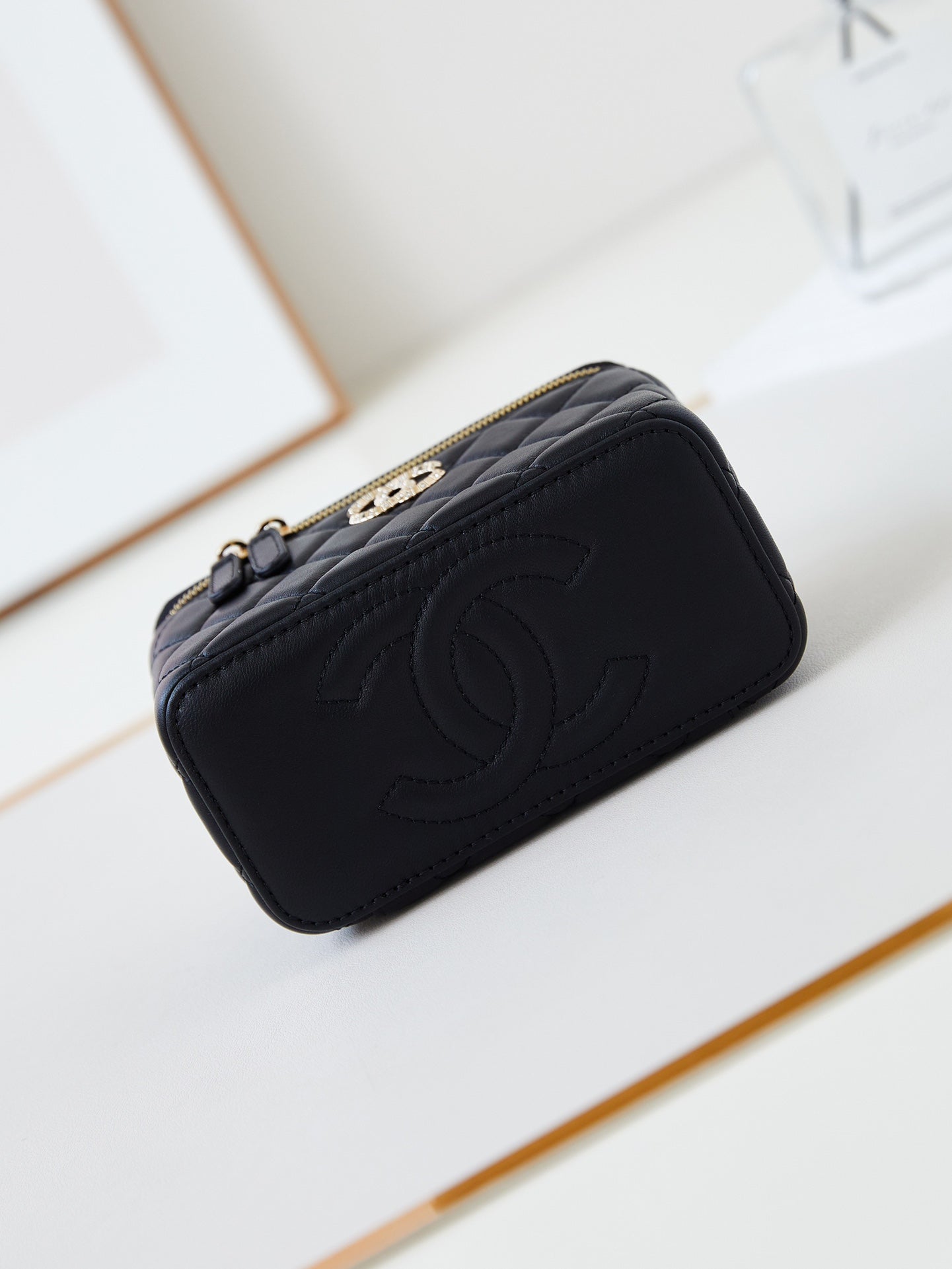 CHANEL 25S MINI VANITY BAG 16 CM IN BLACK LAMBSKIN WITH CRYSTAL-EMBELLISHED CC LOGO