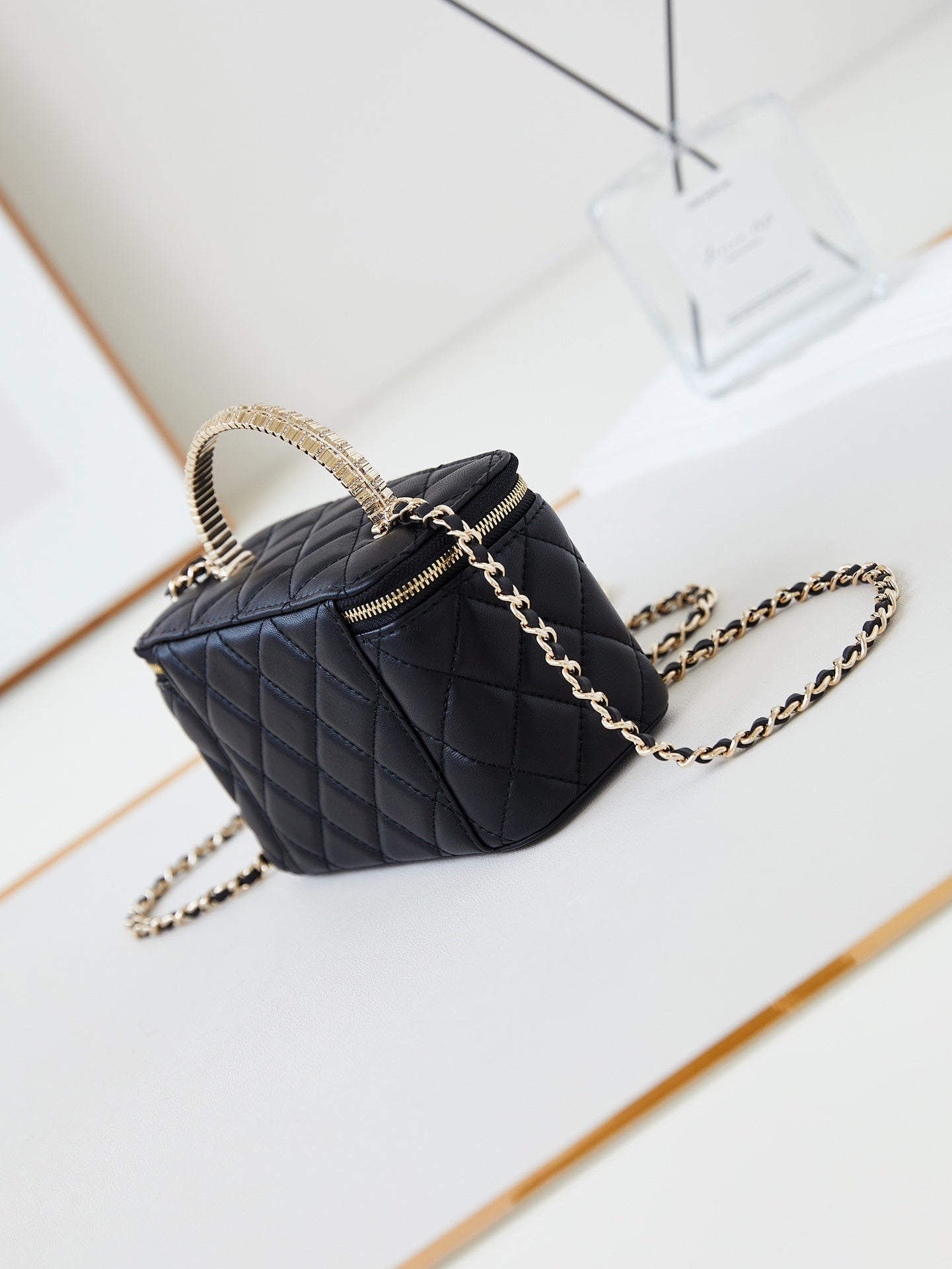 CHANEL 25S MINI VANITY BAG 16 CM IN BLACK LAMBSKIN WITH CRYSTAL-EMBELLISHED CC LOGO