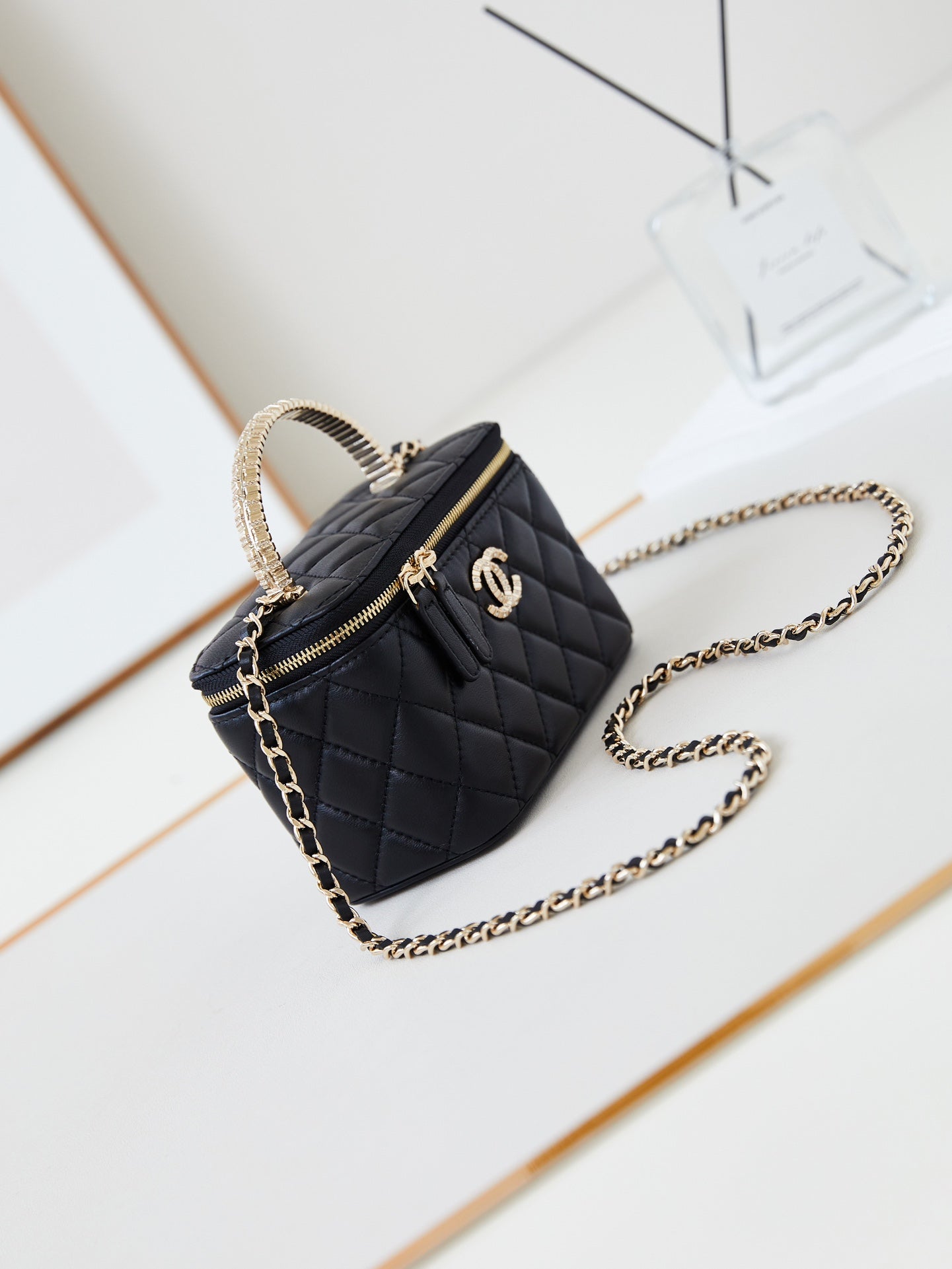 CHANEL 25S MINI VANITY BAG 16 CM IN BLACK LAMBSKIN WITH CRYSTAL-EMBELLISHED CC LOGO