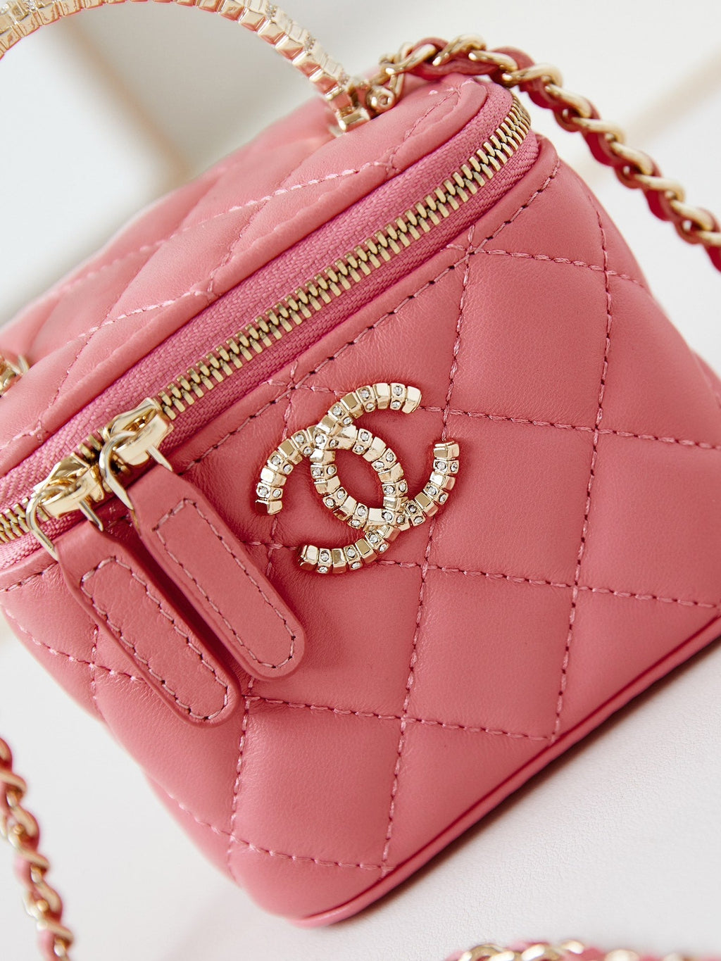 CHANEL 25S MINI VANITY BAG 11 CM IN PEACH PINK LAMBSKIN WITH CRYSTAL-EMBELLISHED CC LOGO