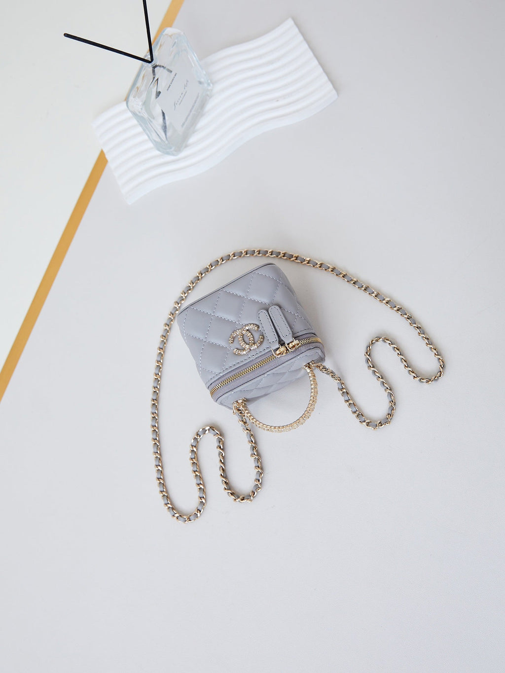 CHANEL 25S MINI VANITY BAG 11 CM IN GREY LAMBSKIN WITH CRYSTAL-EMBELLISHED CC LOGO