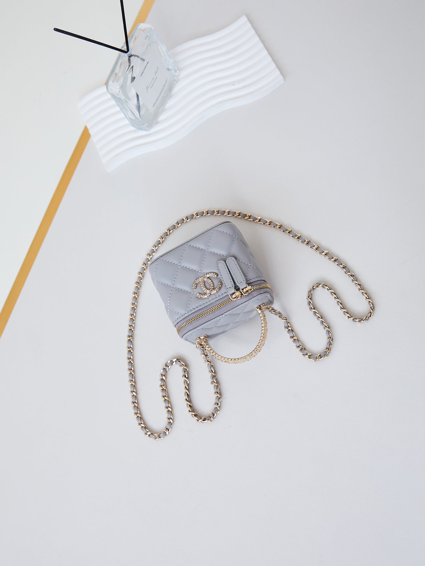 CHANEL 25S MINI VANITY BAG 11 CM IN GREY LAMBSKIN WITH CRYSTAL-EMBELLISHED CC LOGO