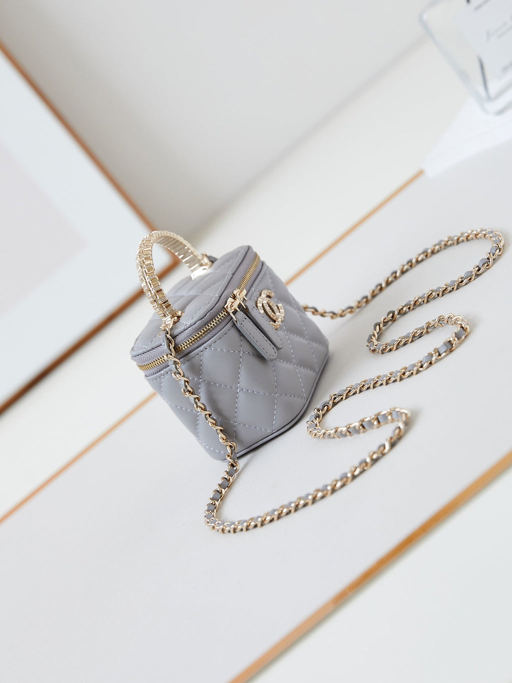CHANEL 25S MINI VANITY BAG 11 CM IN GREY LAMBSKIN WITH CRYSTAL-EMBELLISHED CC LOGO