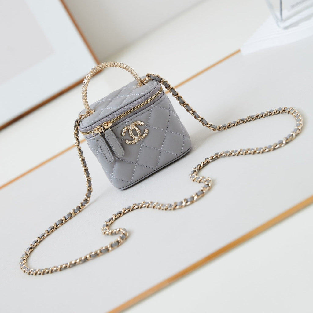 CHANEL 25S MINI VANITY BAG 11 CM IN GREY LAMBSKIN WITH CRYSTAL-EMBELLISHED CC LOGO