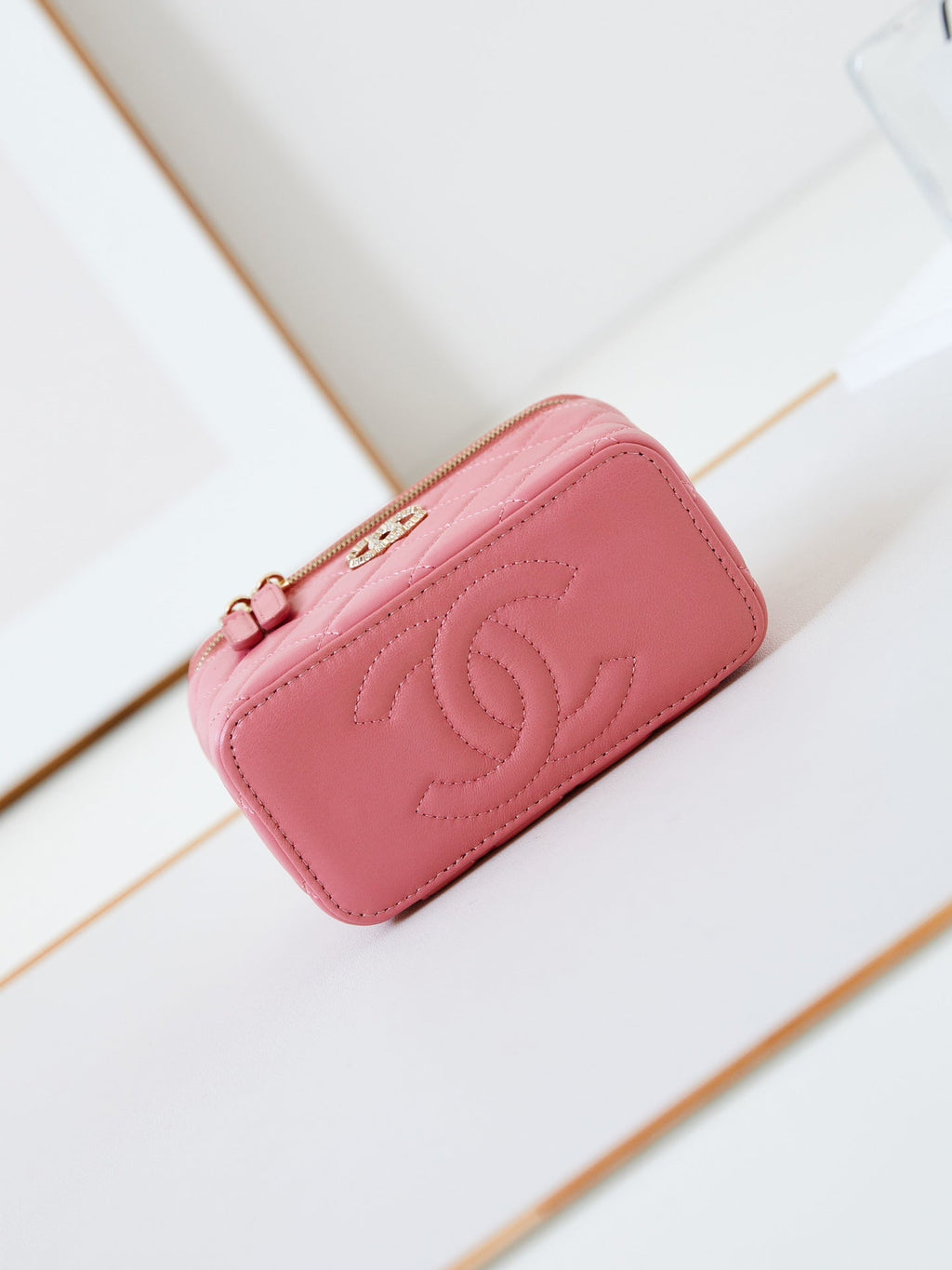 CHANEL 25S MINI VANITY BAG 16 CM IN PEACHY PINK LAMBSKIN WITH CRYSTAL-EMBELLISHED CC LOGO