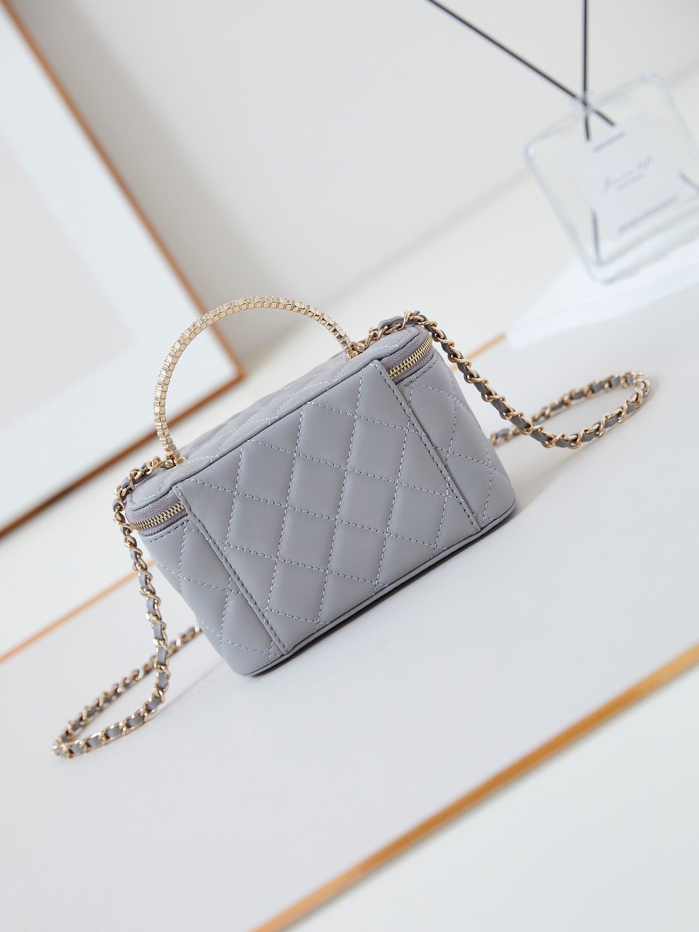 CHANEL 25S MINI VANITY BAG 16 CM IN GREY LAMBSKIN WITH CRYSTAL-EMBELLISHED CC LOGO
