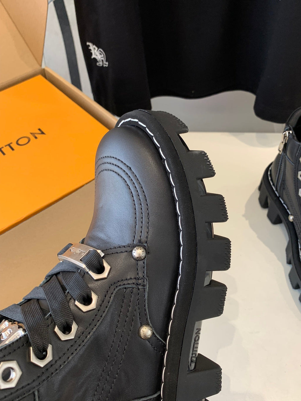 LV CHECKER ANKLE BOOT IN BLACK CALFSKIN