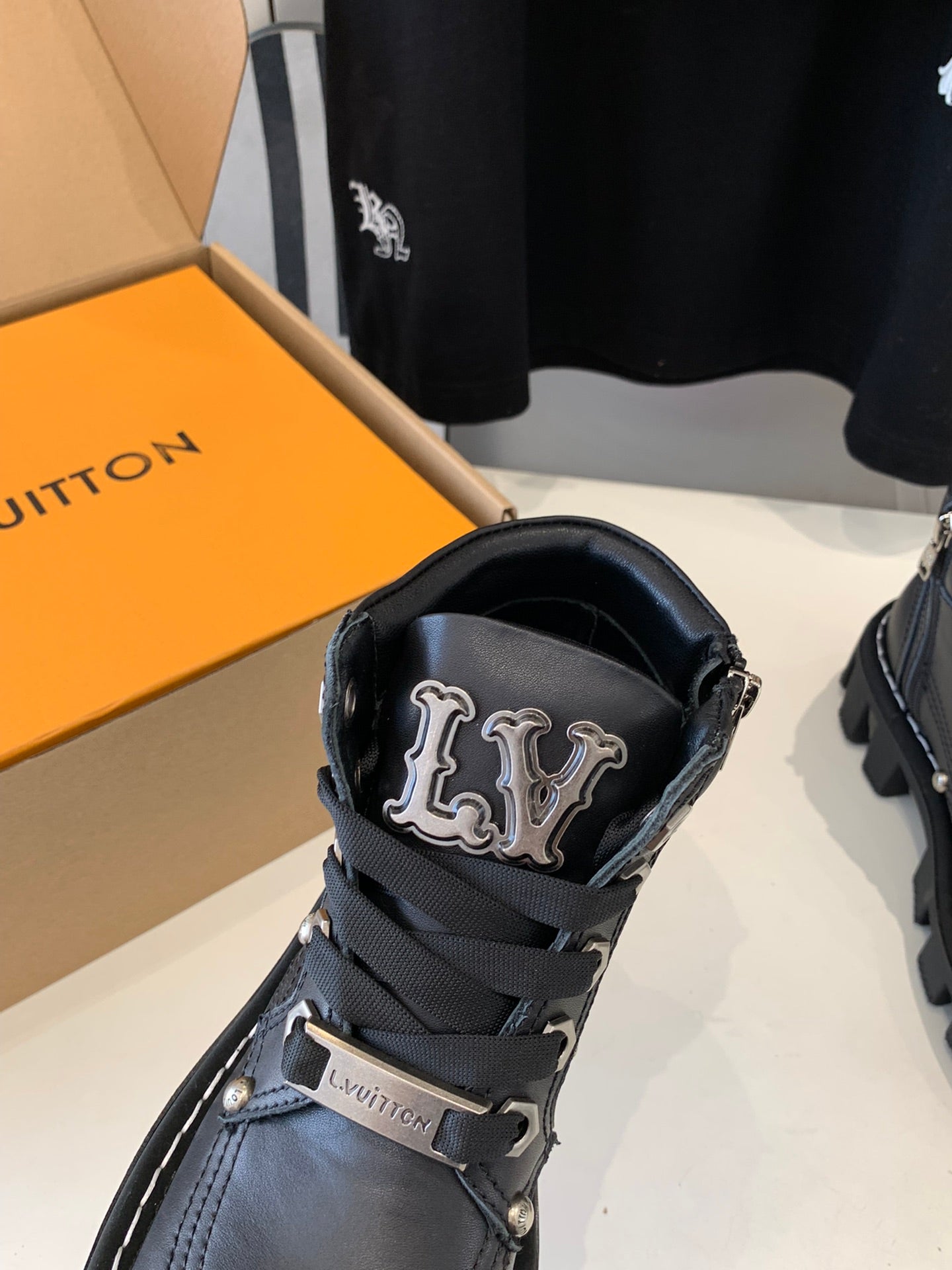 LV CHECKER ANKLE BOOT IN BLACK CALFSKIN