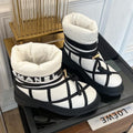 SKI BOOTS IN WHITE MIX BLACK QUILTED COTTON