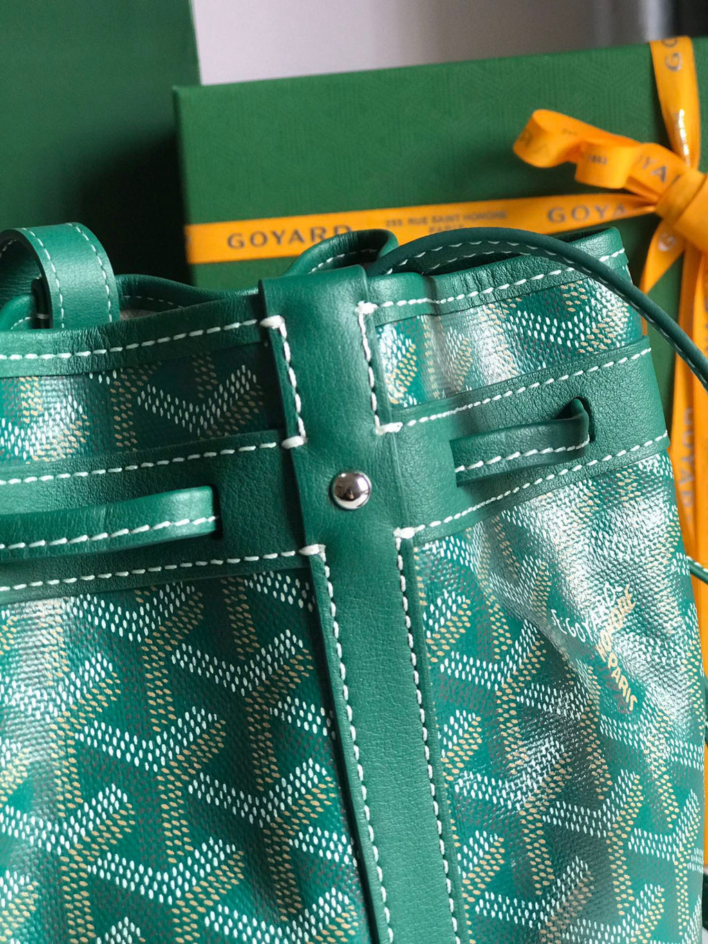 PETIT FLOT BUCKET BAG 22 IN GREEN GOYARDINE CANVAS AND LAMBSKIN TRIM