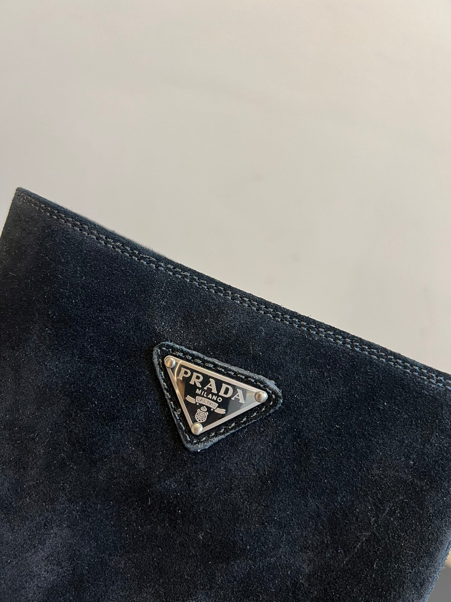 PRADA 25S HIGH-CUT PLATFORM BOOTS IN BLACK SUEDE WITH SILVER HARDWARE