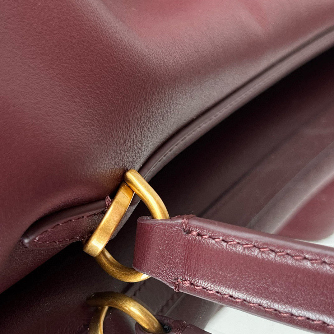 RODEO MEDIUM BAG 35 IN BURGUNDY SMOOTH CALFSKIN GOLD HARDWARE