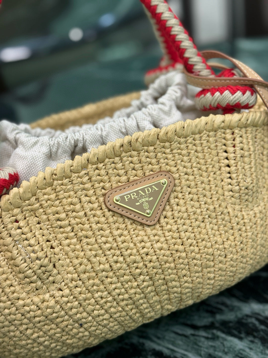 PRA HANDBAG 26 IN BEIGE RAFFIA AND RED WOVEN HANDLES