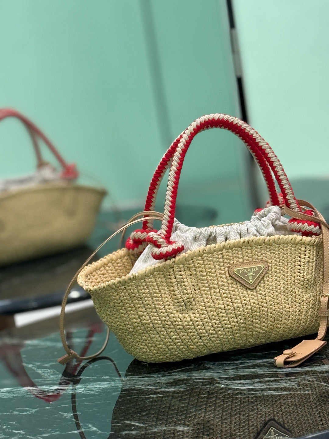 PRA HANDBAG 26 IN BEIGE RAFFIA AND RED WOVEN HANDLES