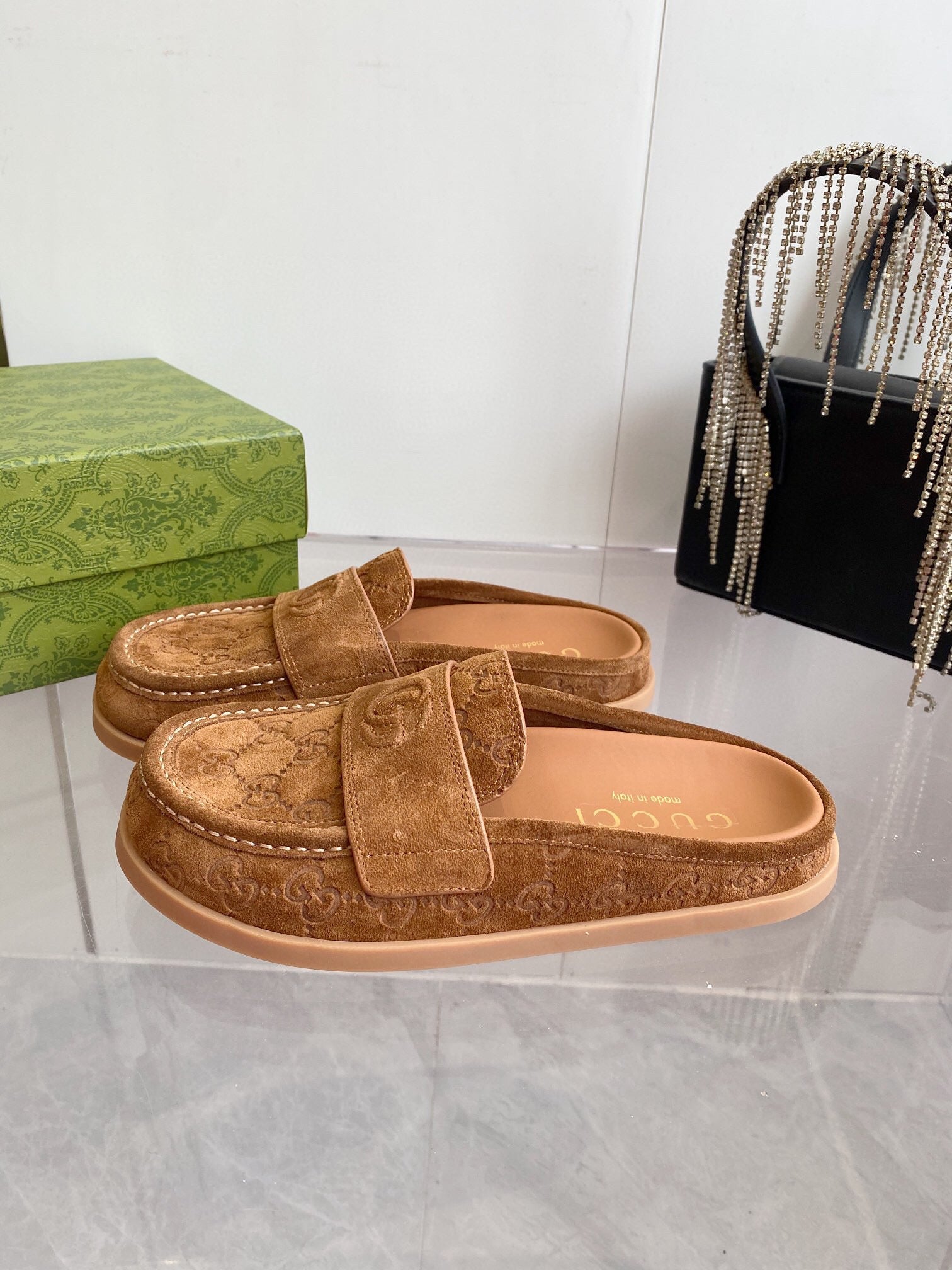 GG LOAFERS IN BROWN MONOGRAM EMBOSSED SUEDE