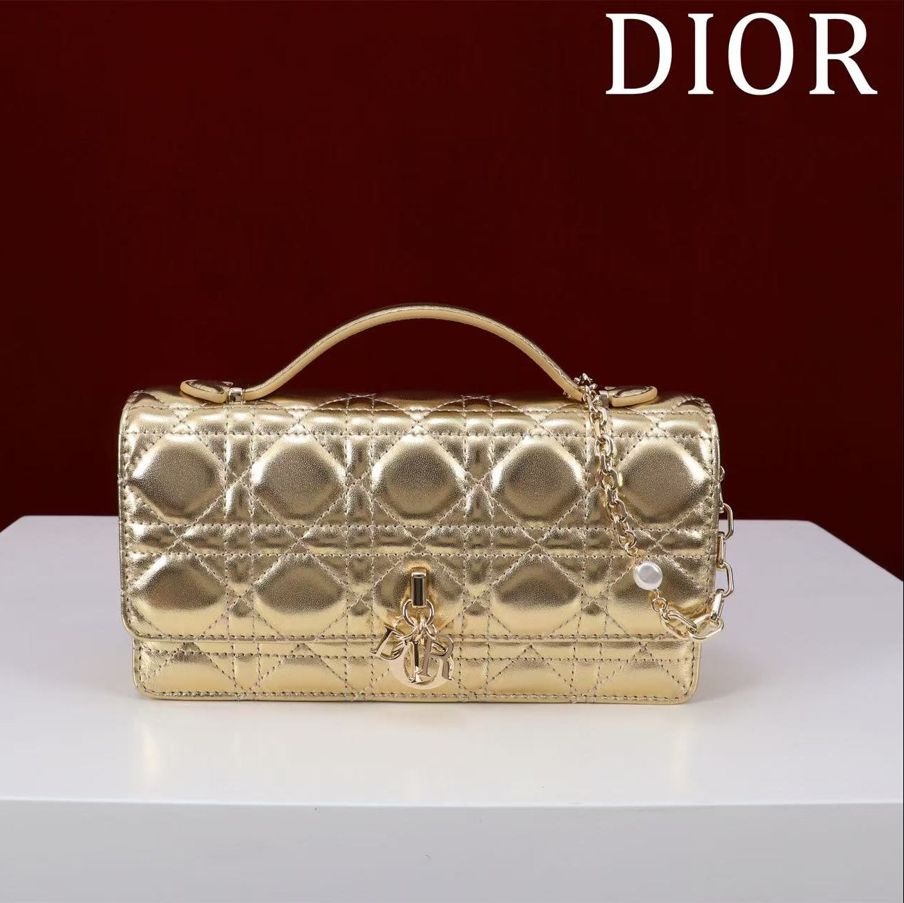 CD BAG 21 IN GOLD CALFSKIN WITH GOLD HARDWARE