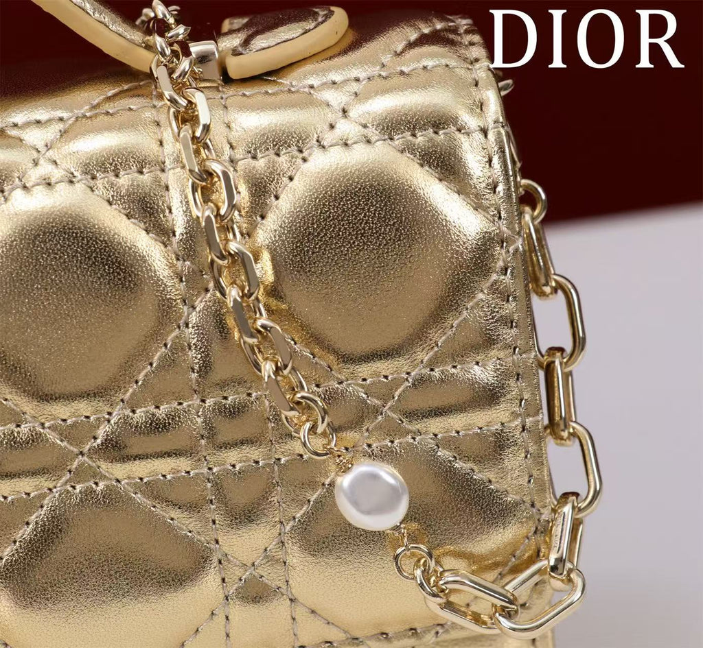 CD BAG 21 IN GOLD CALFSKIN WITH GOLD HARDWARE