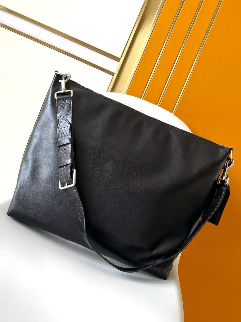 LV SHOULDER BAG 48 IN BLACK CALFSKIN EMBOSSED STRAP