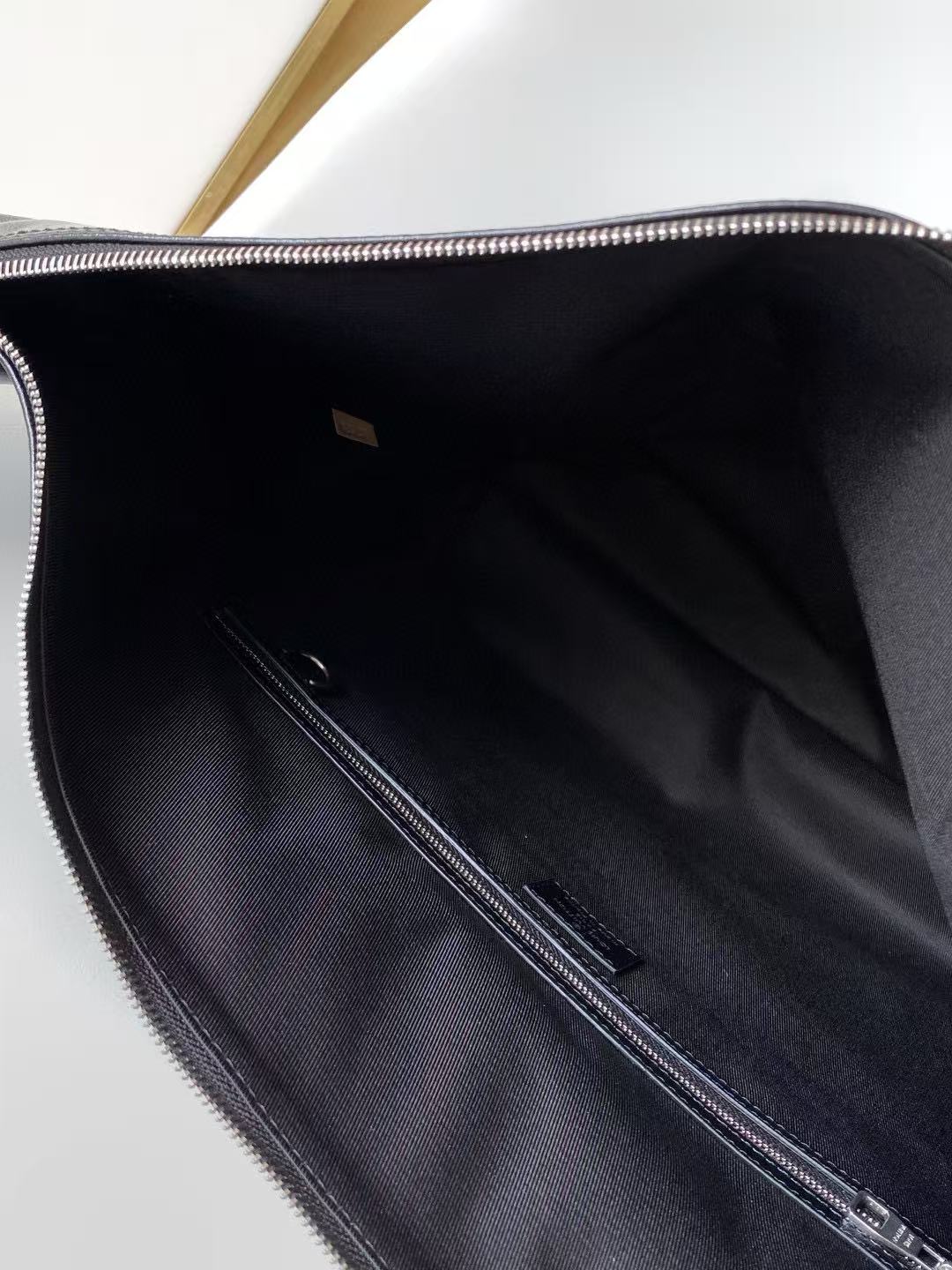 LV SHOULDER BAG 48 IN BLACK CALFSKIN EMBOSSED STRAP