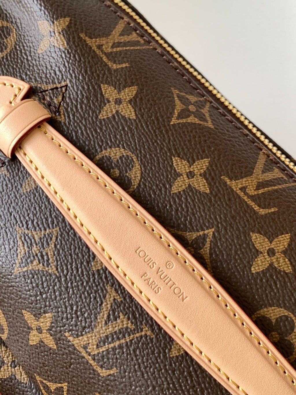 LV BUMBAG 37 IN BROWN COATED MONOGRAM CANVAS