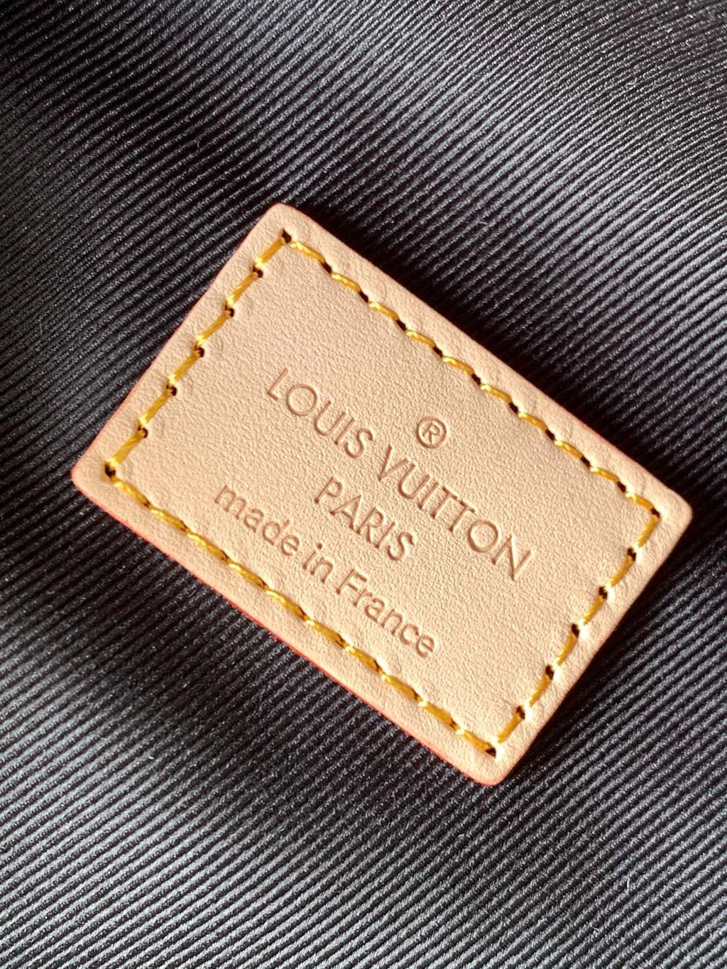 LV BUMBAG 37 IN BROWN COATED MONOGRAM CANVAS