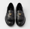 PRADA LOAFER IN BLACK PATENT CALFSKIN