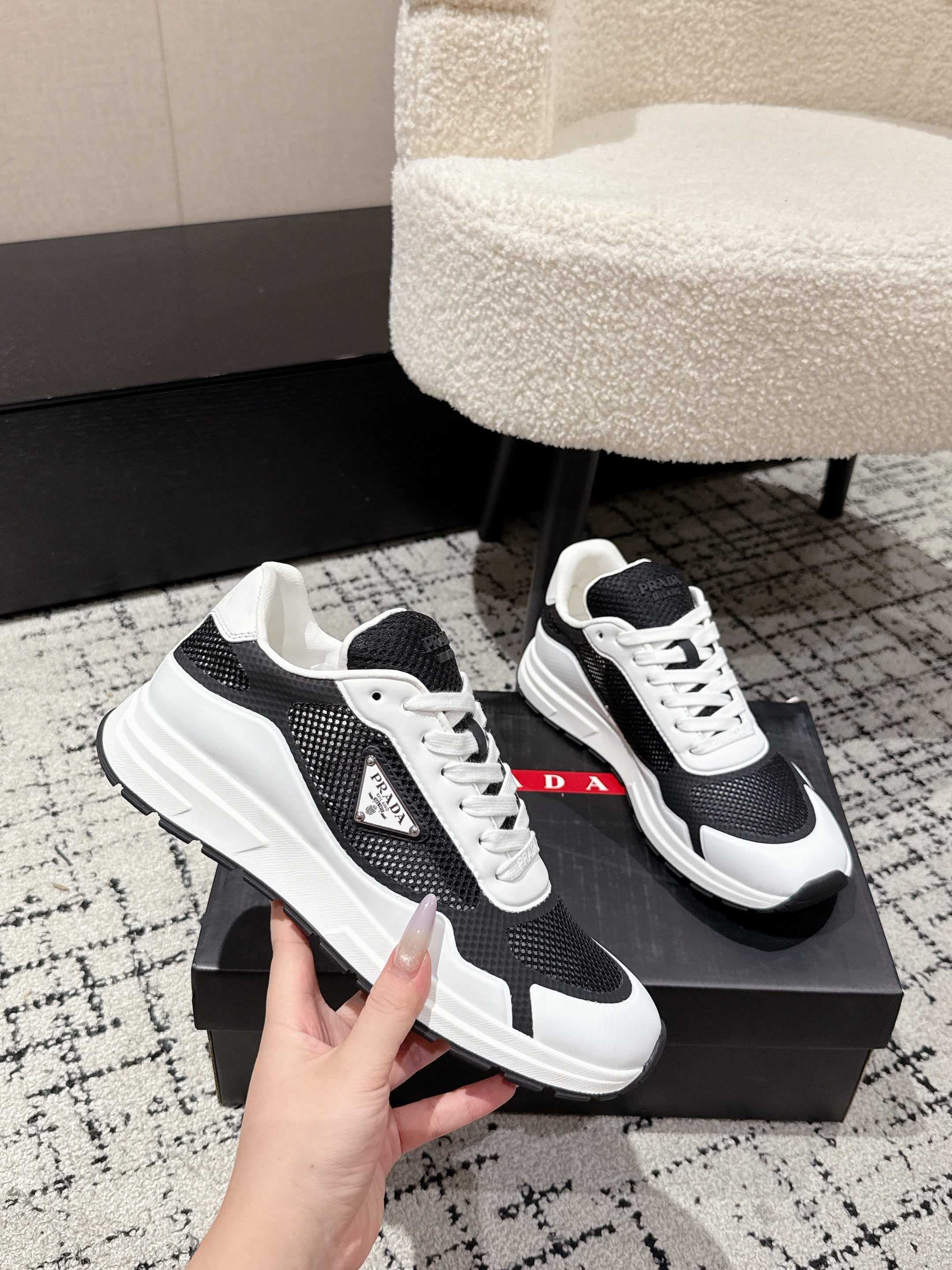 PRADA 25S MEN SNEAKERS IN BLACK AND WHITE CANVAS