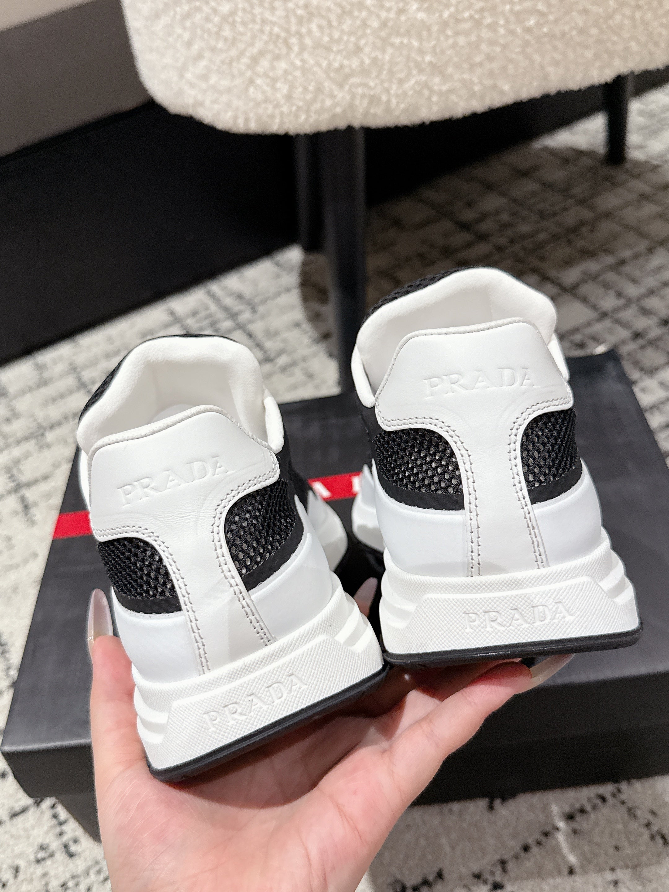 PRADA 25S MEN SNEAKERS IN BLACK AND WHITE CANVAS