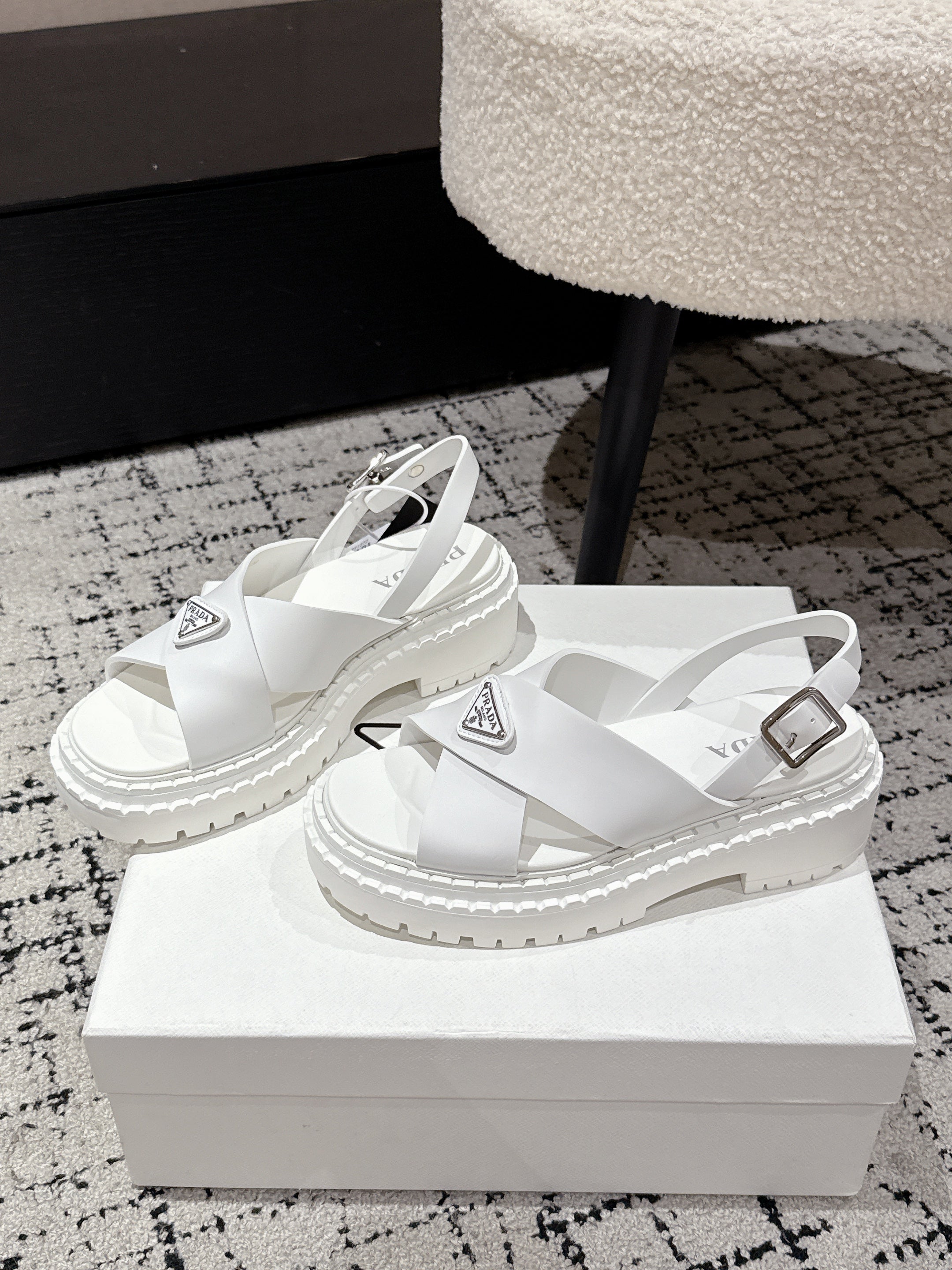 PRADA 25S CRISSCROSS SANDALS IN WHITE CALFSKIN LOGO