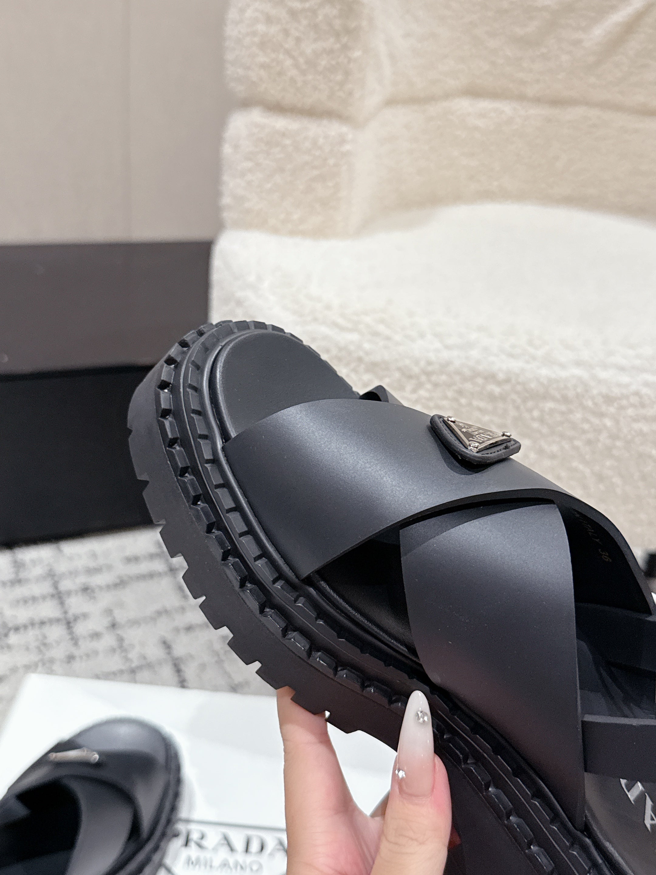 PRADA 25S CRISSCROSS SANDALS IN BLACK CALFSKIN LOGO