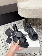 PRADA 25S CRISSCROSS SANDALS IN BLACK CALFSKIN LOGO
