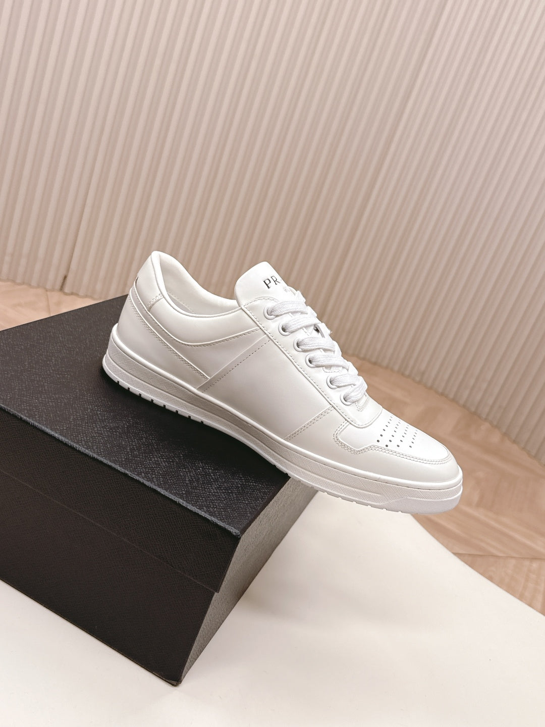 PRADA 25S DOWNTOWN SNEAKERS IN WHITE CALFSKIN SILVER HARDWARE