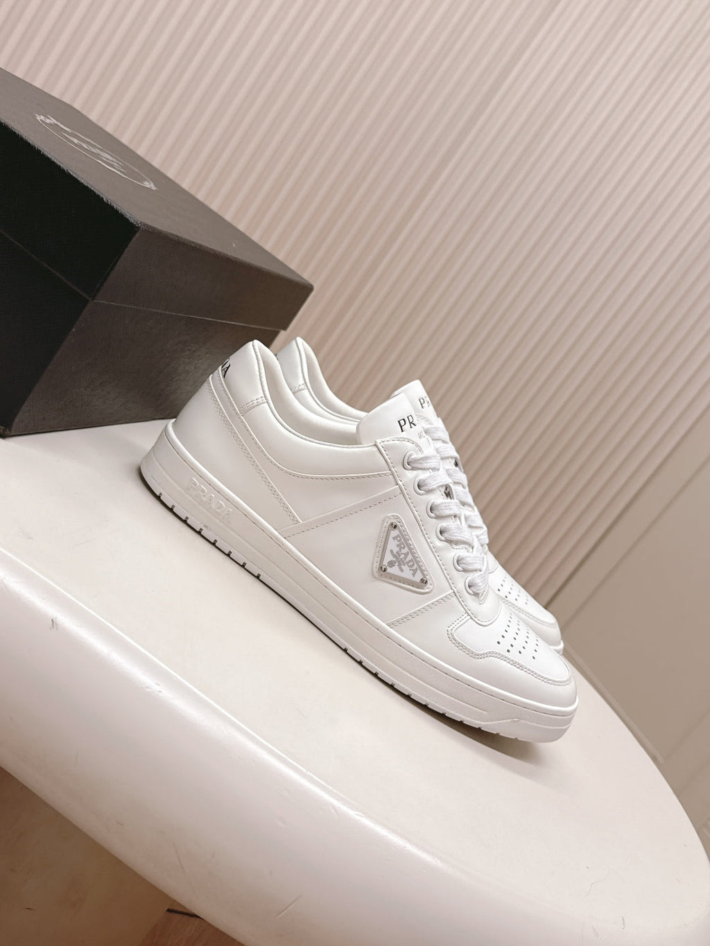 PRADA 25S DOWNTOWN SNEAKERS IN WHITE CALFSKIN SILVER HARDWARE
