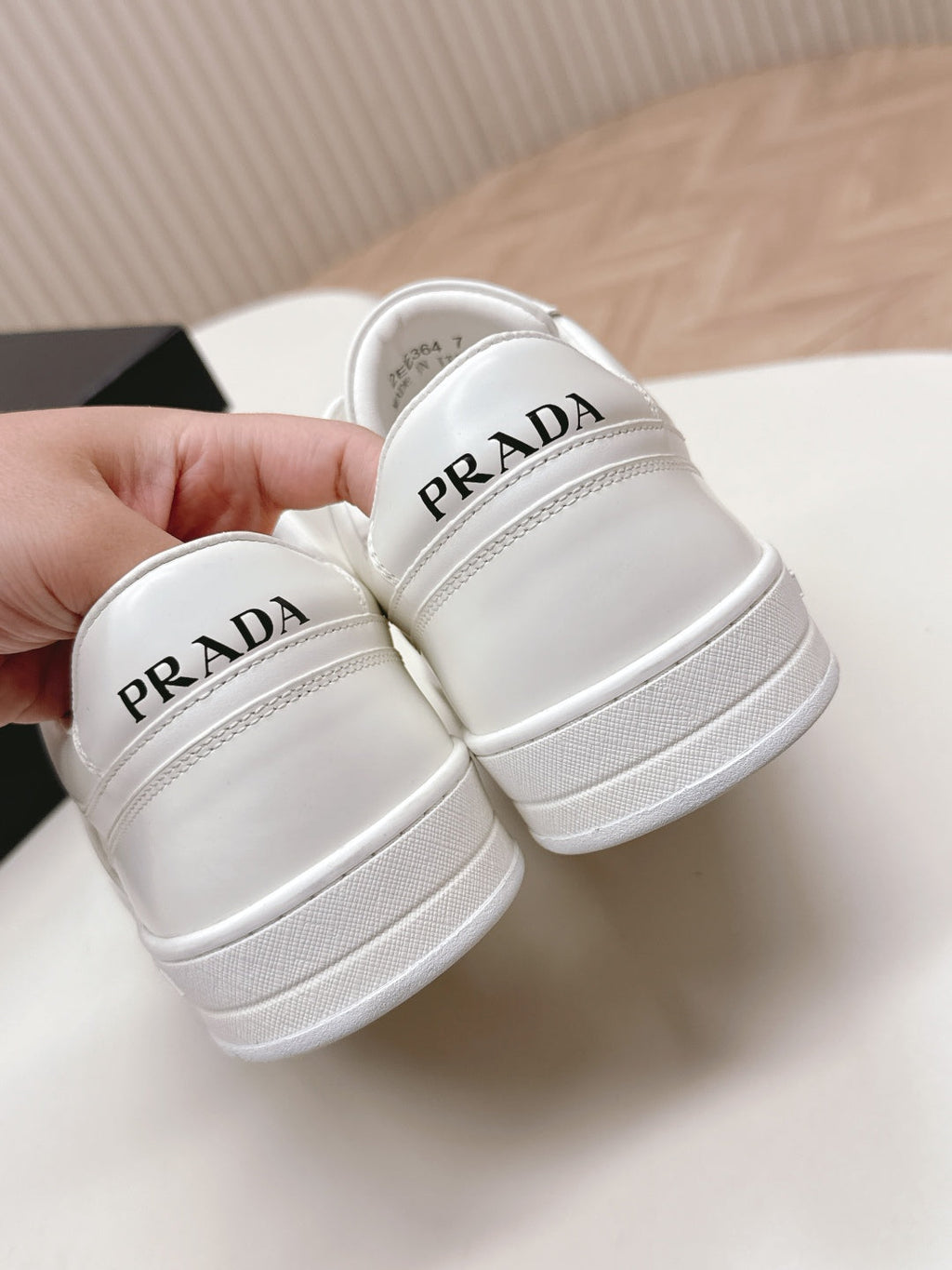 PRADA 25S DOWNTOWN SNEAKERS IN WHITE CALFSKIN SILVER HARDWARE