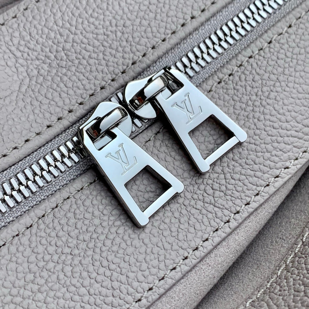 ONTHEGO EAST WEST BAG 25 IN BICOLOR MONOGRAM EMPREINTE LEATHER