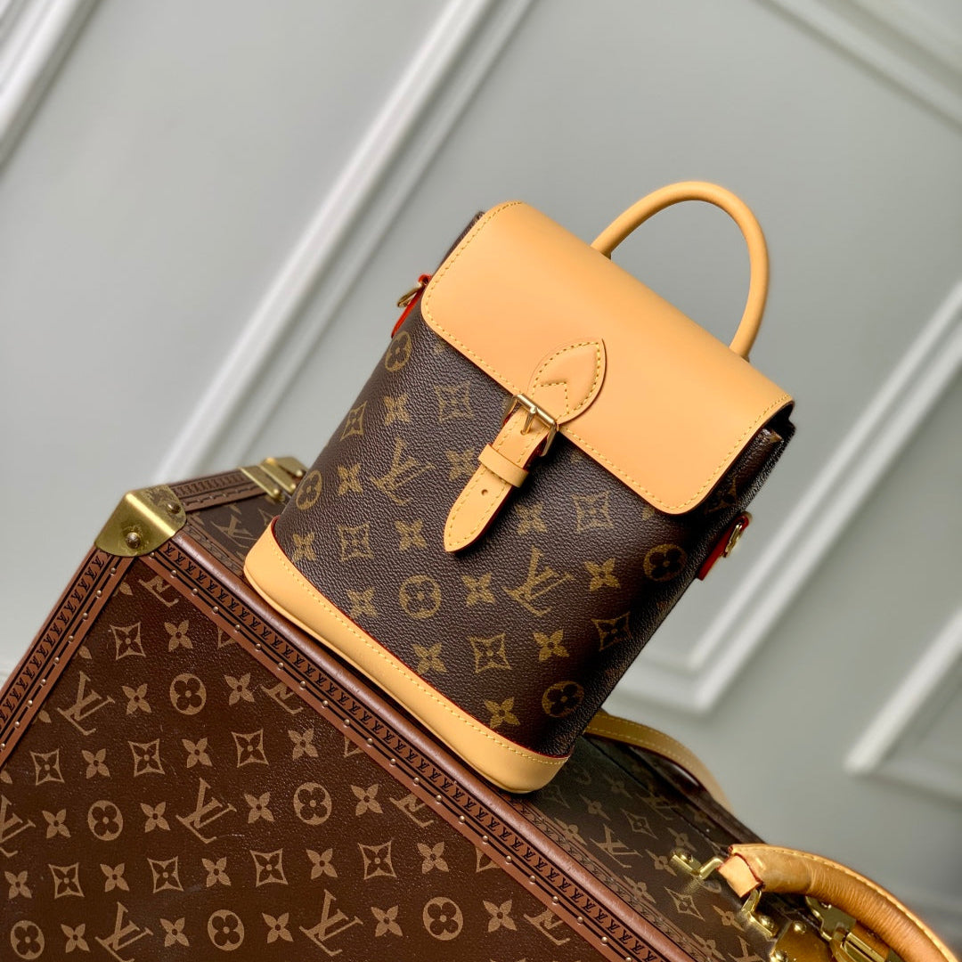 SOHO MINI 23 IN BROWN MONOGRAM COATED CANVAS AND CALFSKIN