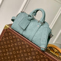 KEEPALL BANDOULIÈRE 25 BAG IN MISTY LAKE GREEN MONOGRAM TAURILLON CALFSKIN