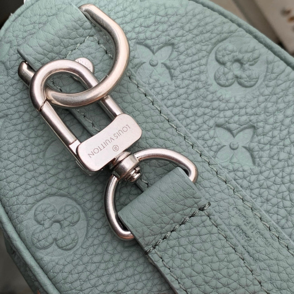 KEEPALL BANDOULIÈRE 25 BAG IN MISTY LAKE GREEN MONOGRAM TAURILLON CALFSKIN