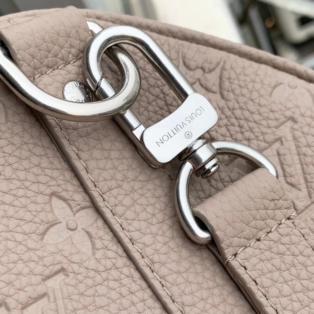 KEEPALL BANDOULIÈRE 34 BAG IN LIGHT BROWN MONOGRAM TAURILLON CALFSKIN