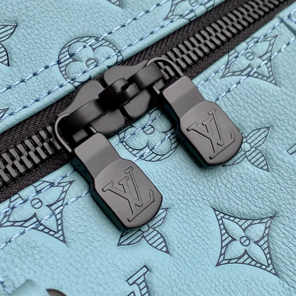 KEEPALL BANDOULIÈRE 50 IN SKY BLUE MONOGRAM SHADOW EMBOSSED CALFSKIN