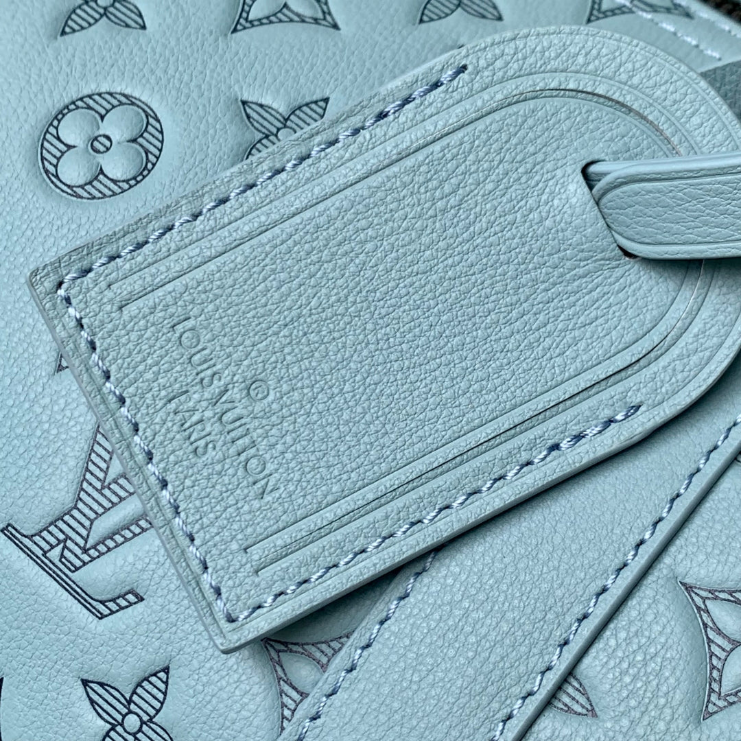 KEEPALL BANDOULIÈRE 50 IN SKY BLUE MONOGRAM SHADOW EMBOSSED CALFSKIN