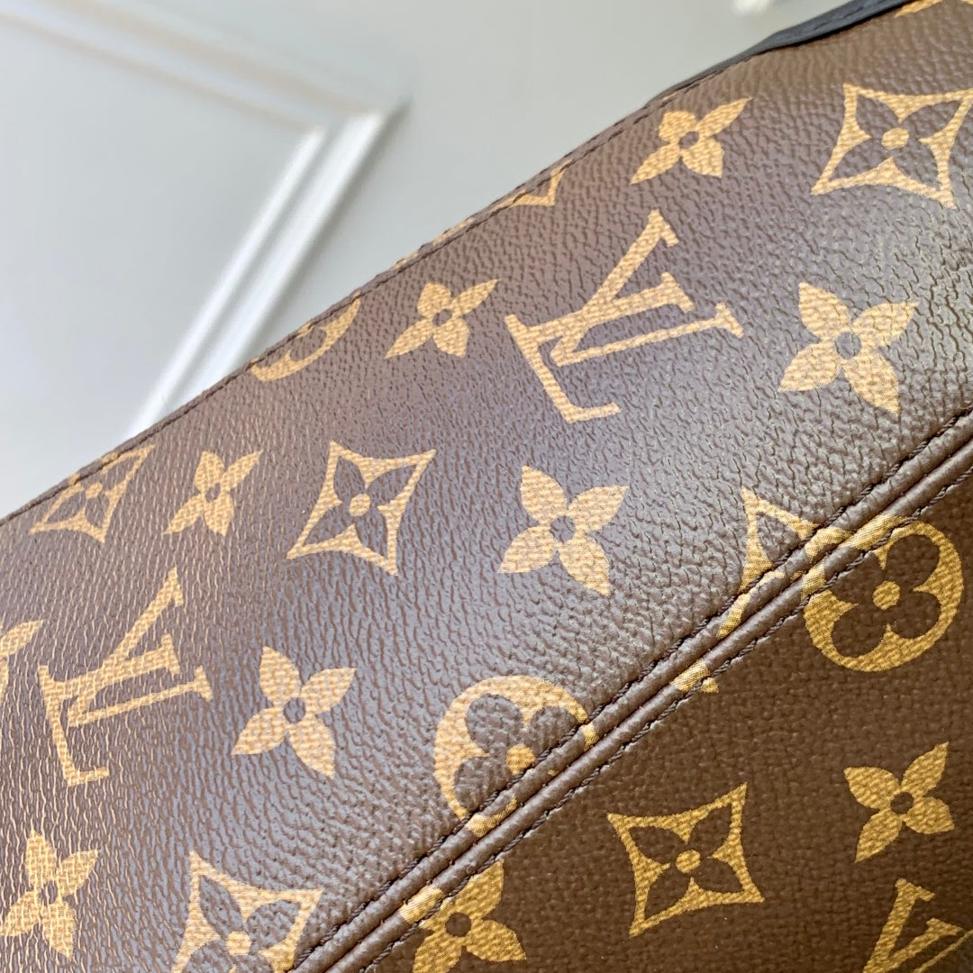 THE DROP PM 28 IN BROWN MONOGRAM COATED CANVAS AND CALFSKIN