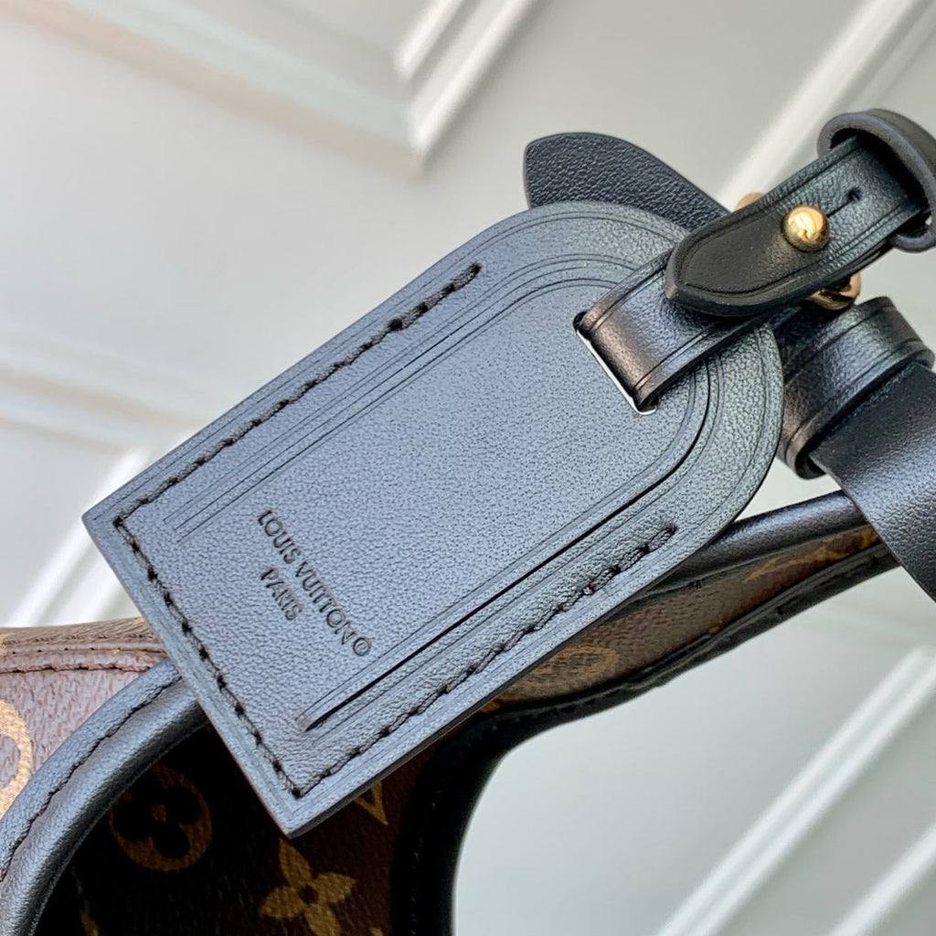 THE DROP PM 28 IN BROWN MONOGRAM COATED CANVAS AND CALFSKIN