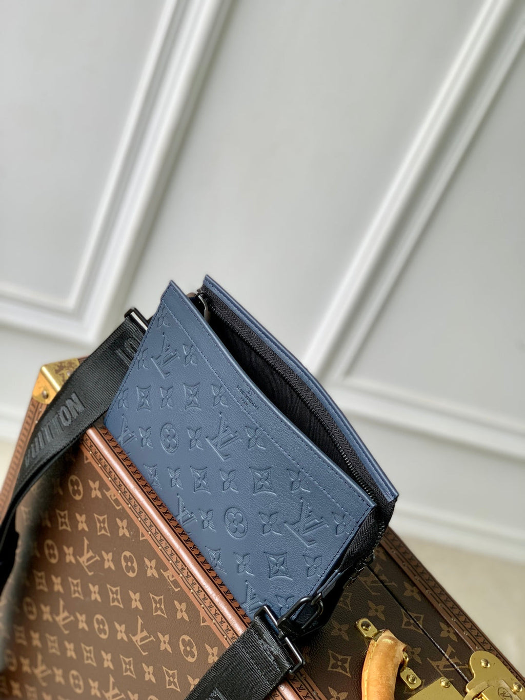 POCHETTE VOYAGE 22 IN DARK BLUE MONOGRAM SHADOW CALFSKIN