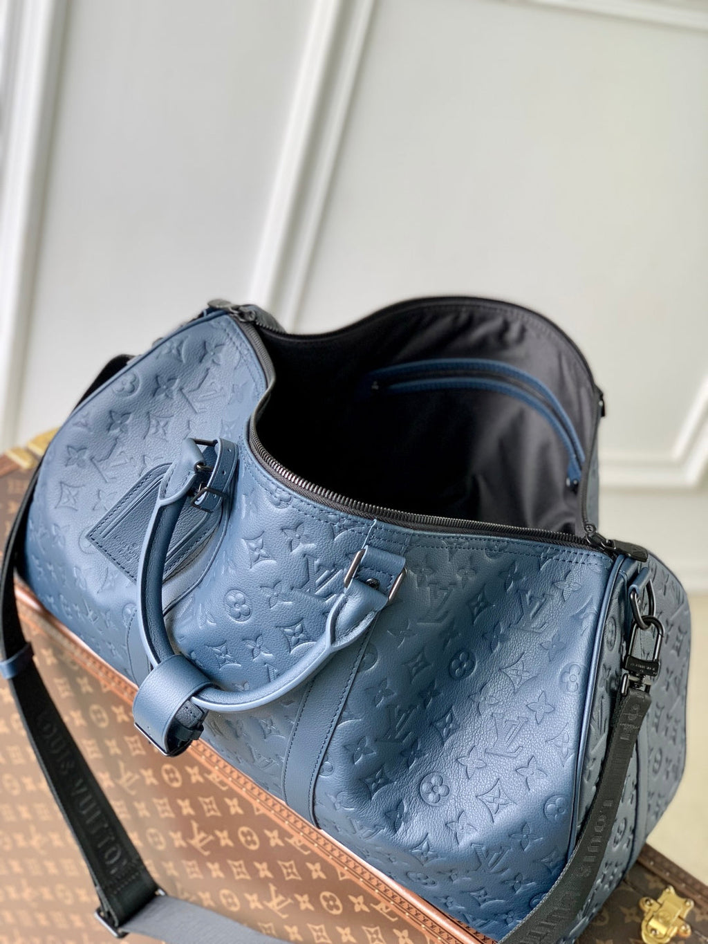 KEEPALL BANDOULIÈRE 50 IN DARK BLUE MONOGRAM SHADOW EMBOSSED CALFSKIN