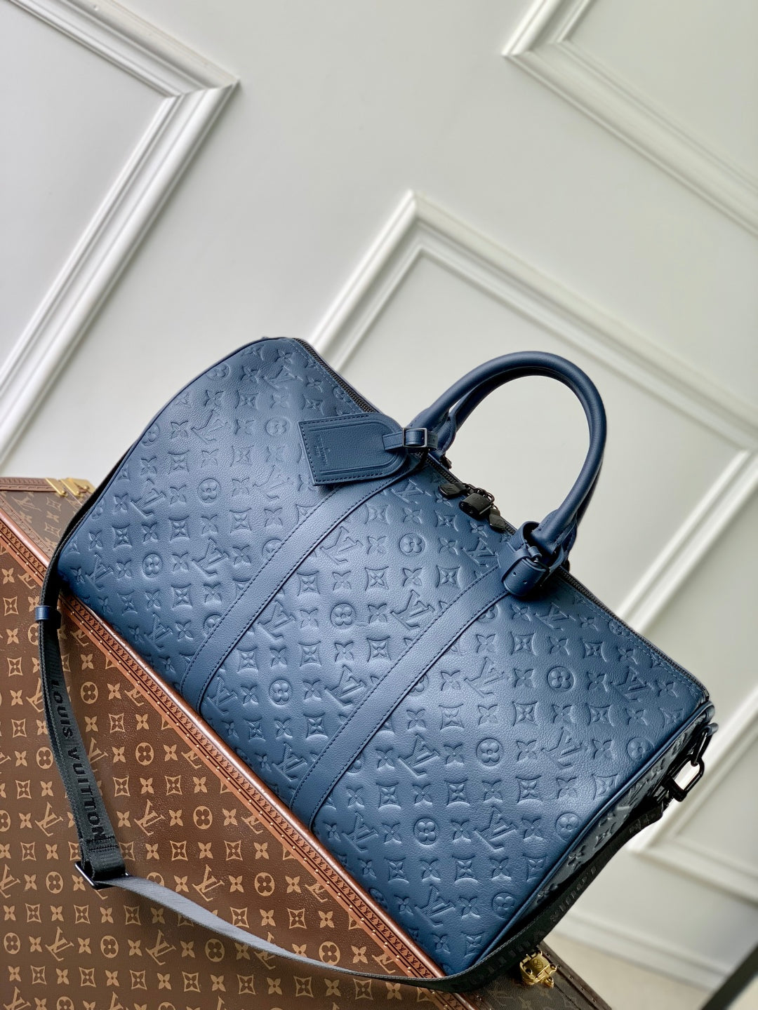 KEEPALL BANDOULIÈRE 50 IN DARK BLUE MONOGRAM SHADOW EMBOSSED CALFSKIN