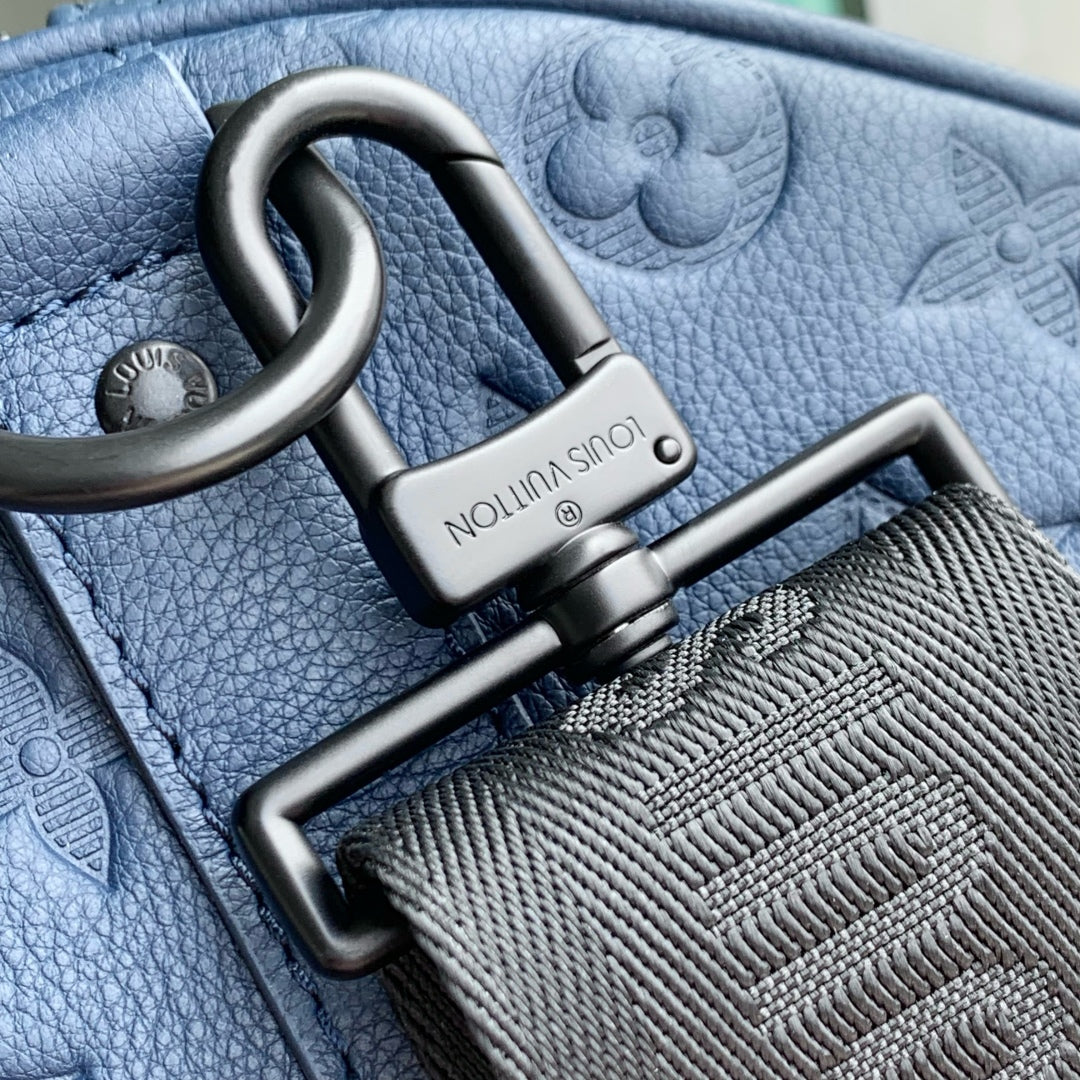 KEEPALL BANDOULIÈRE 50 IN DARK BLUE MONOGRAM SHADOW EMBOSSED CALFSKIN