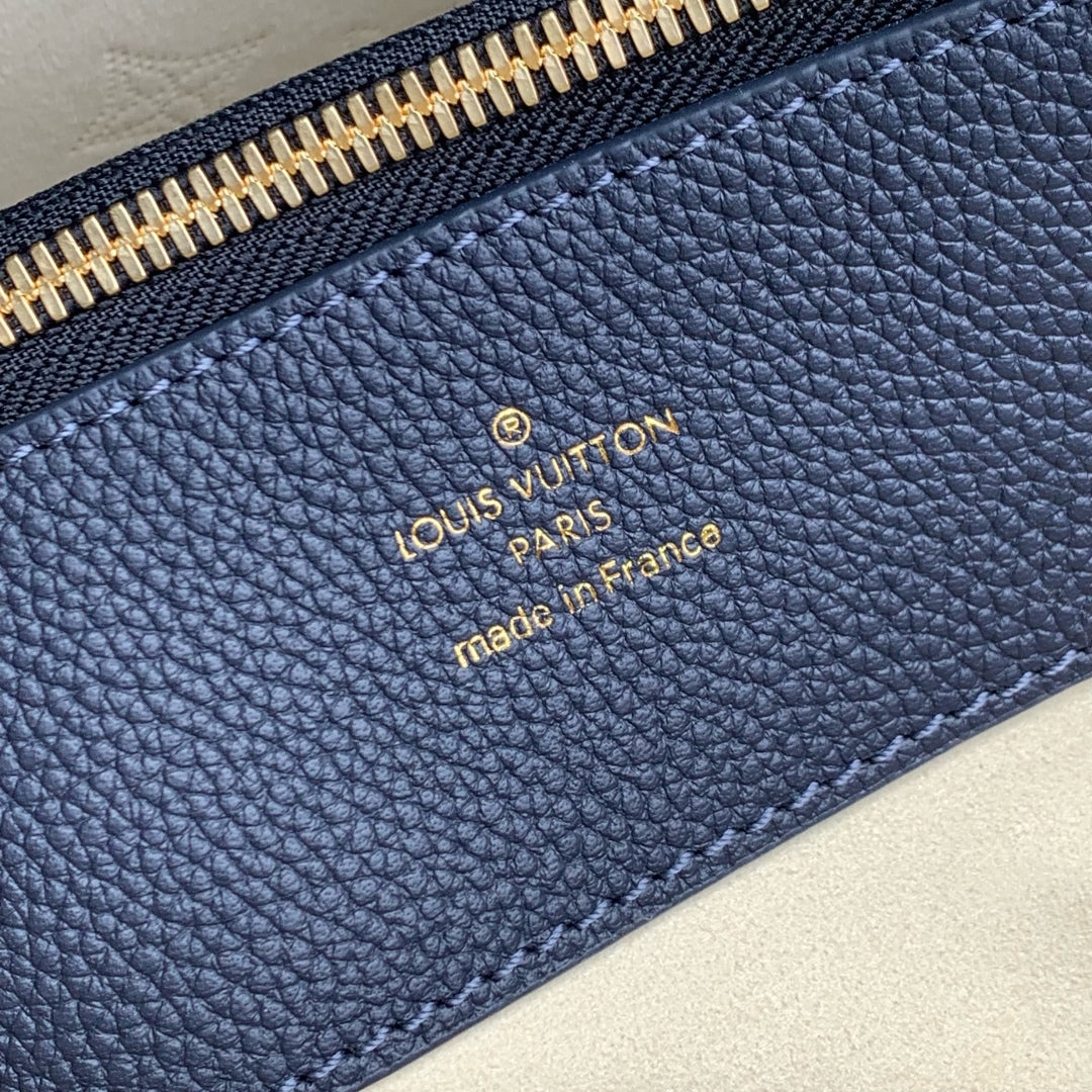 BELLA TOTE 32 IN DARK BLUE MONOGRAM PERFORATED CALFSKIN GOLD HARDWARE