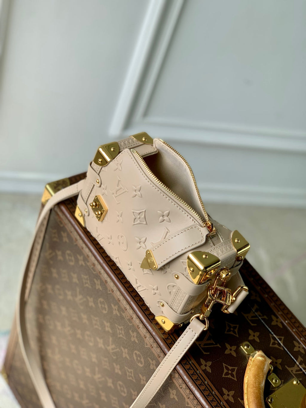 SIDE TRUNK 19 IN BEIGE MONOGRAM BOLD CALFSKIN GOLD HARDWARE