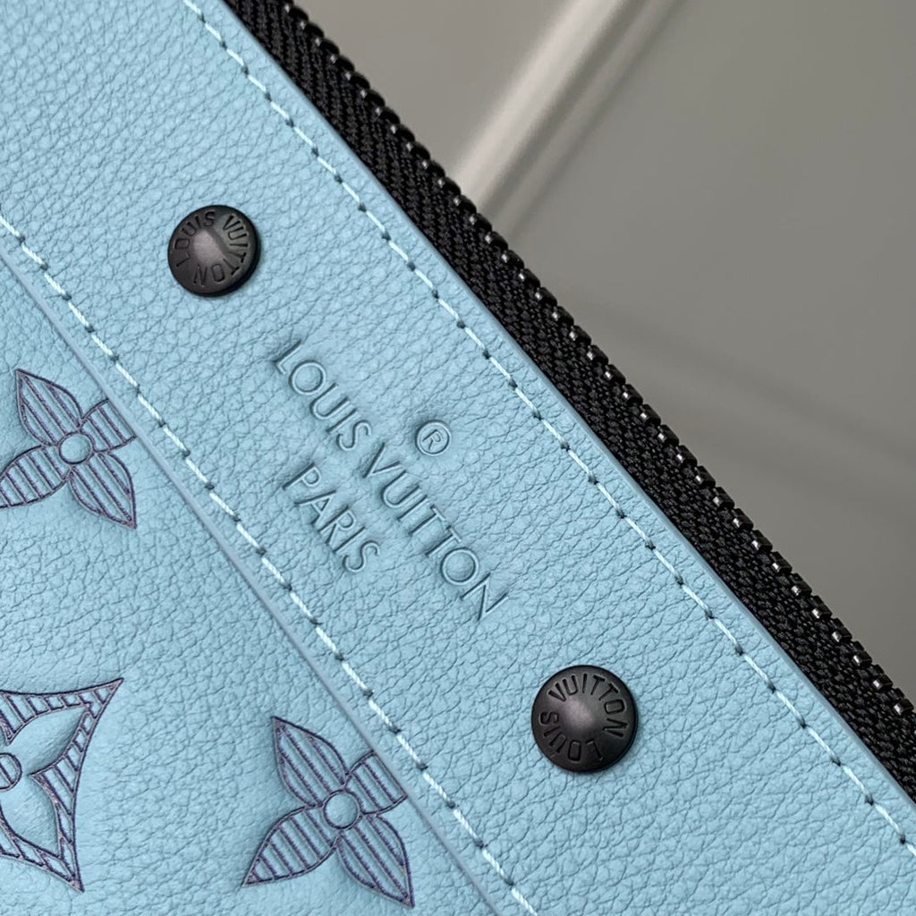 POCHETTE TO GO 30 IN SKY BLUE MONOGRAM SHADOW CALFSKIN EMBOSSED LOGO